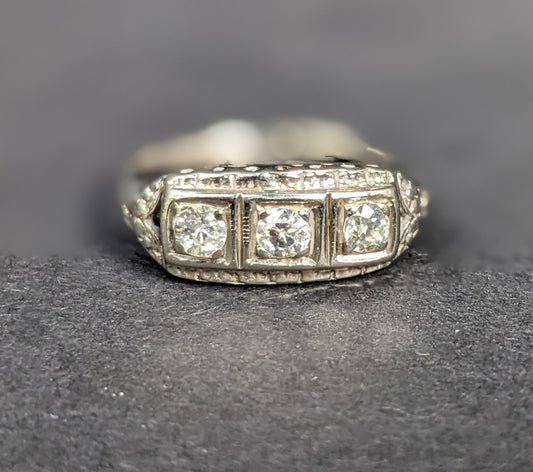 Three stone diamond filigree ring